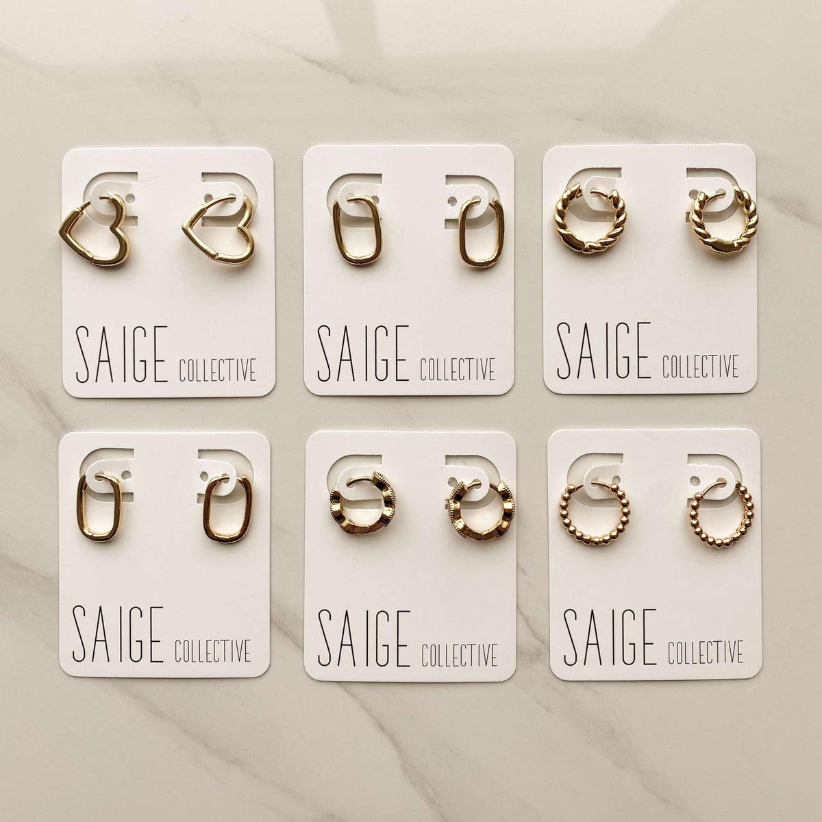 Saige Collective - Goldie Huggie Hoops - 14kt plated