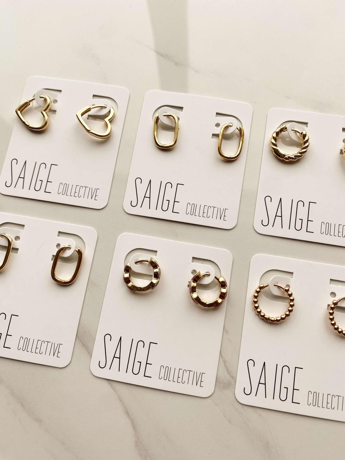 Saige Collective - Goldie Huggie Hoops - 14kt plated 